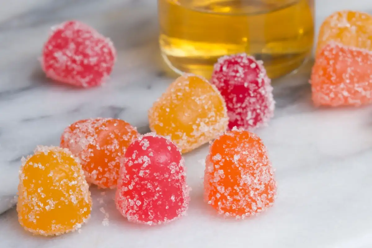 Closeup of CBD gummy candy gumdrops in red