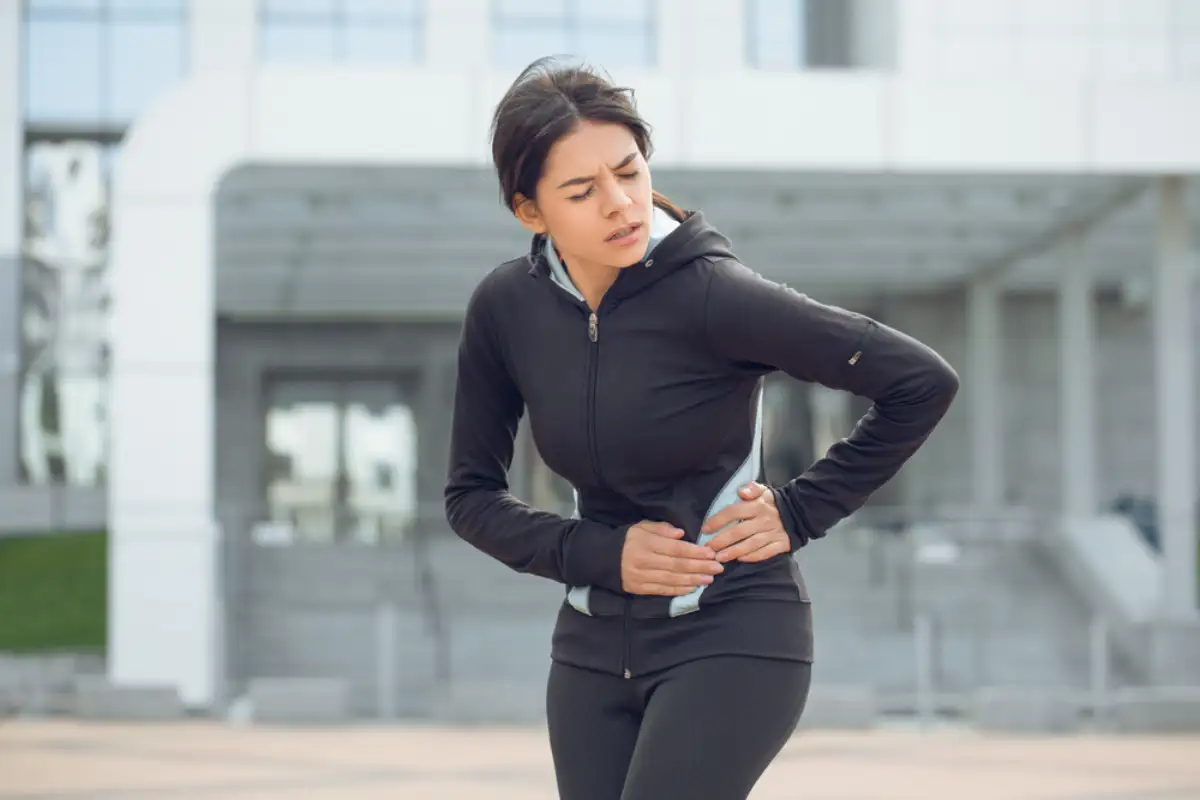 Young Woman having a stomach pain