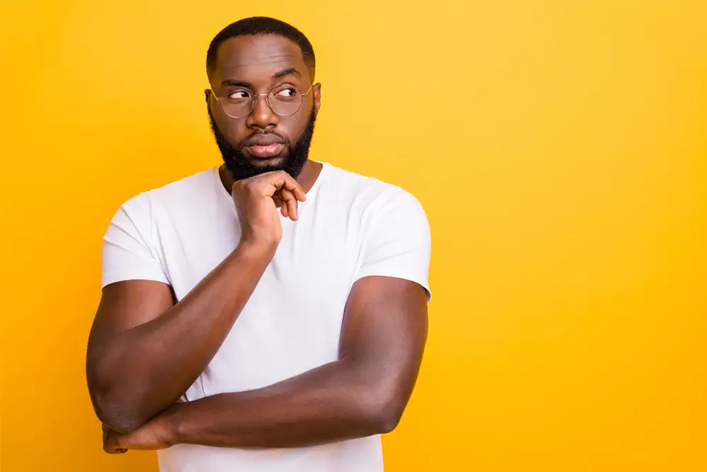 Man thinking pensively about his choices in cannabis