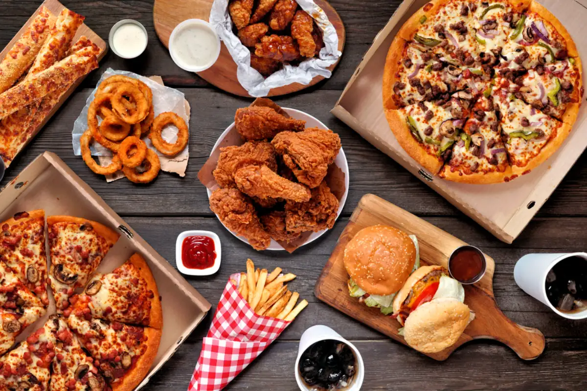 Buffet table scene of take out or delivery foods