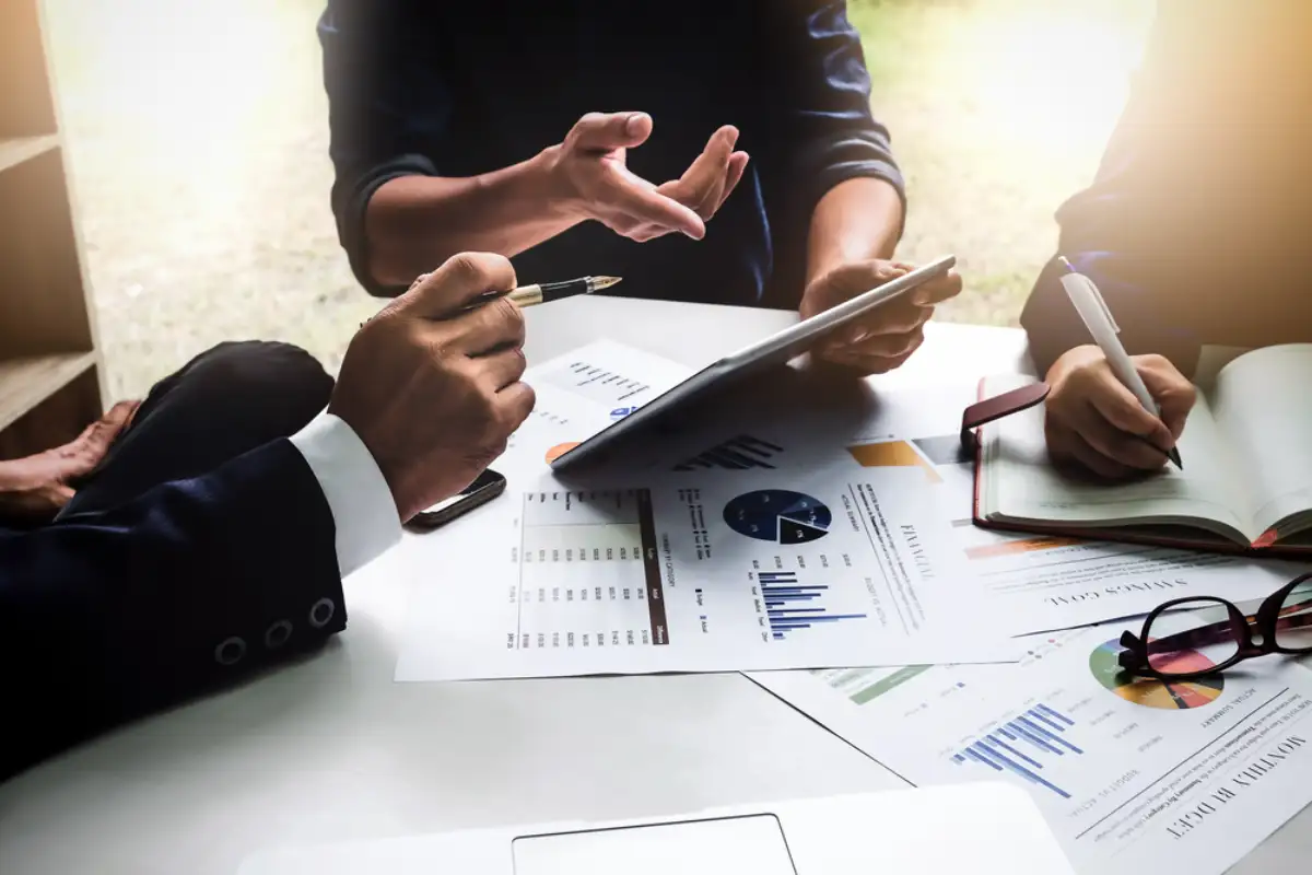 Business people using pen,tablet,notebook