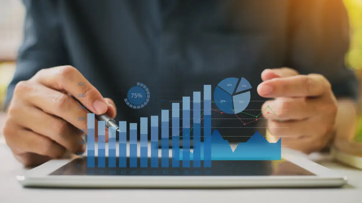 Businessman investment consultant analyzing company financial report balance statement working with digital augmented reality graphics