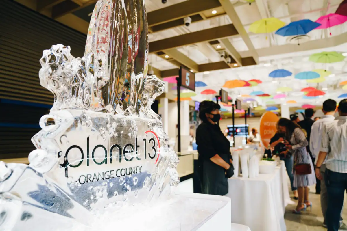 Group of people celebrating Planet 13 Dispensaries Opening