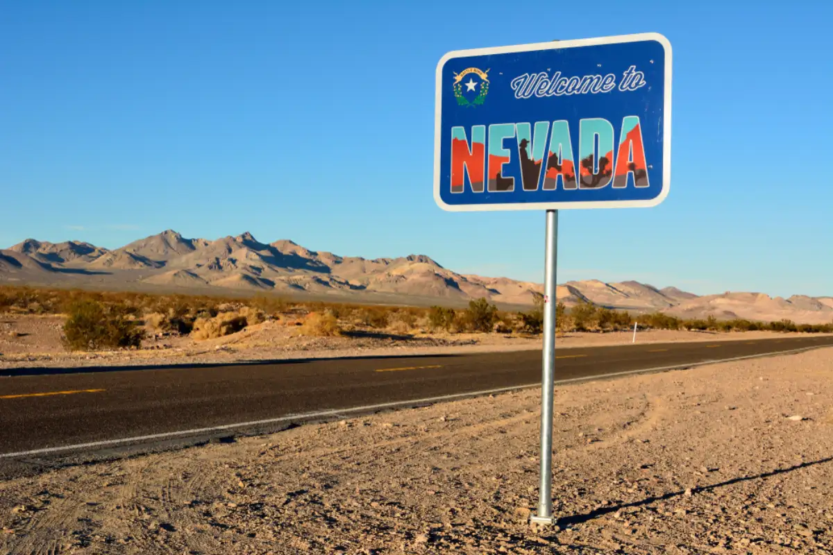 Welcome to Nevada road sign along a highway