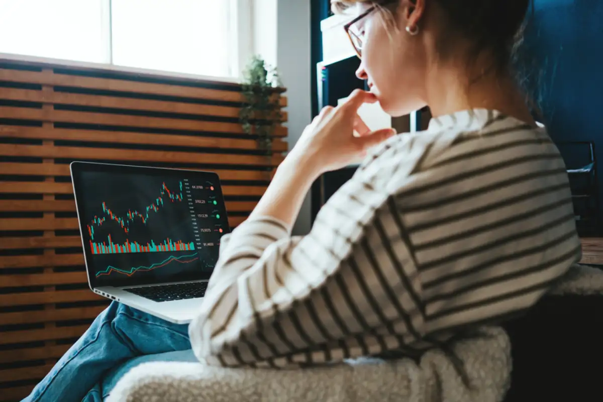 Woman investing in world stock market